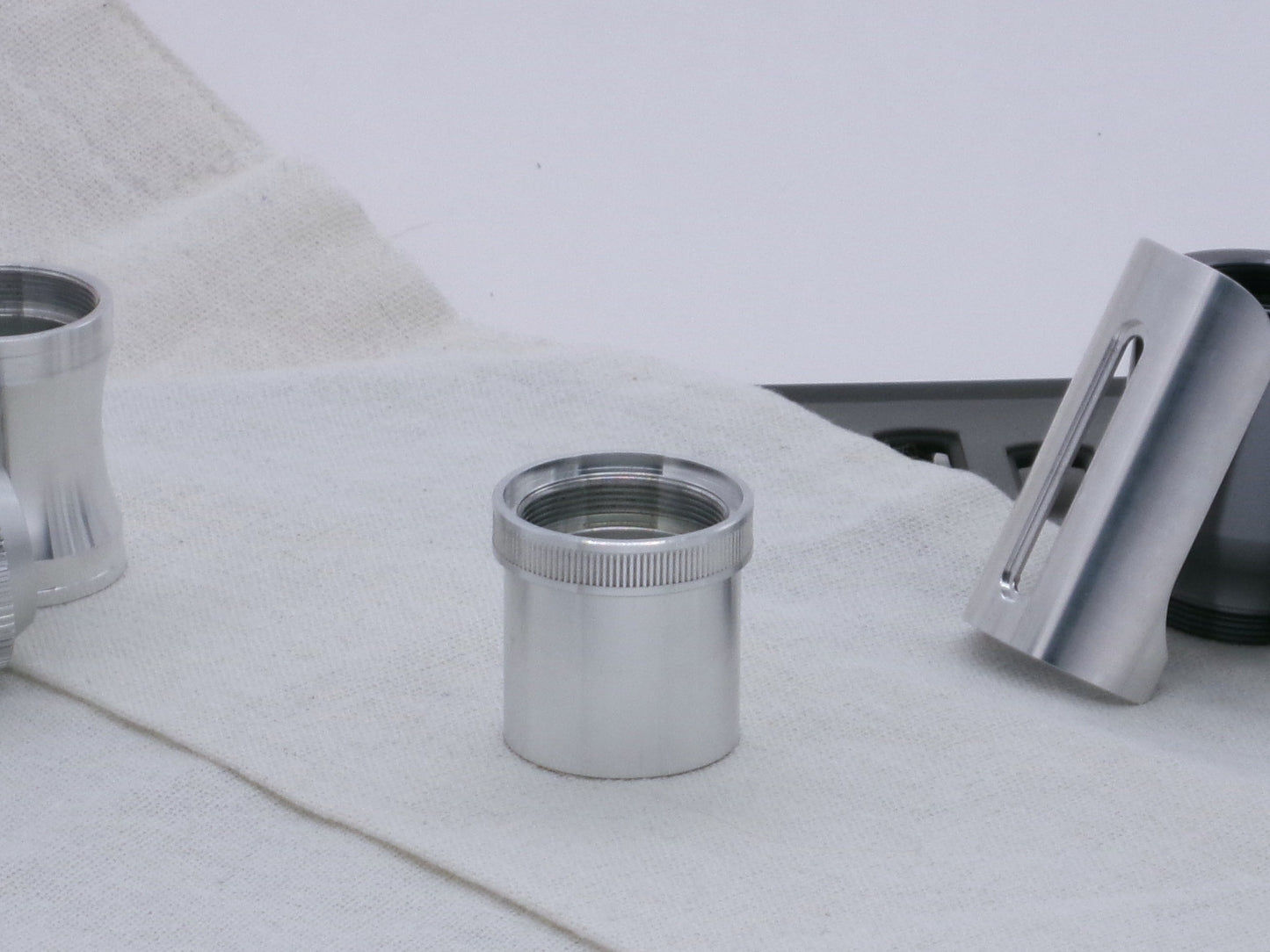 VHC compatible, aluminum lightsaber accent rings atop a lightsaber body segment.