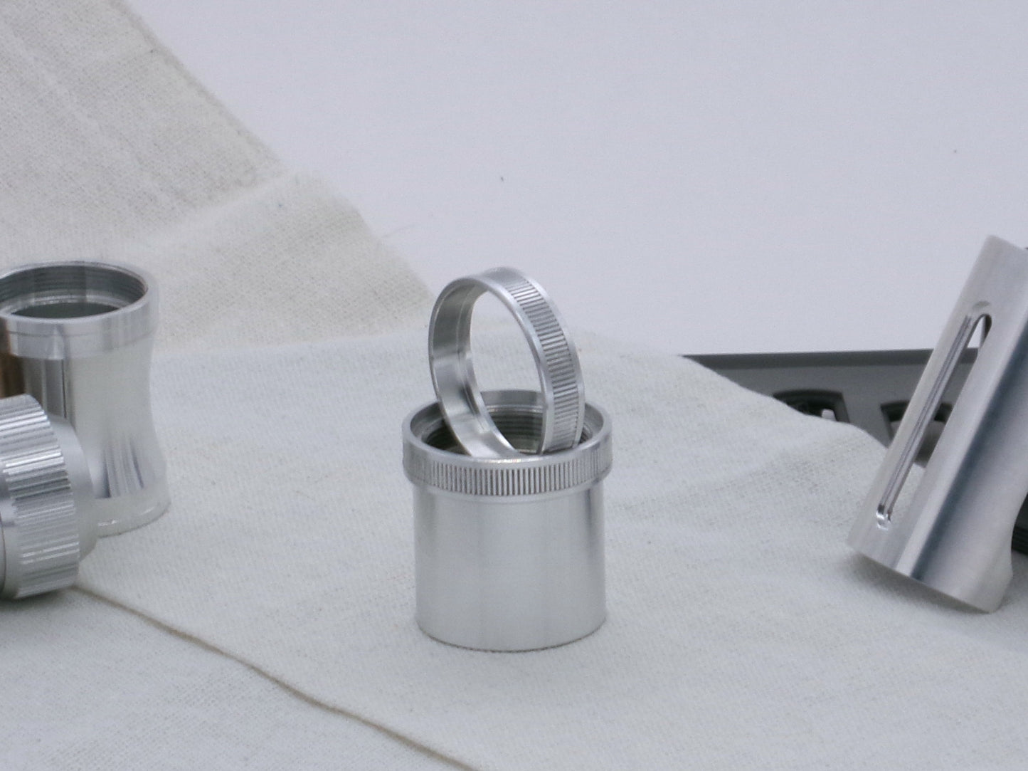 Pair of VHC compatible, aluminum lightsaber accent rings installed and displayed on a lightsaber body segment.