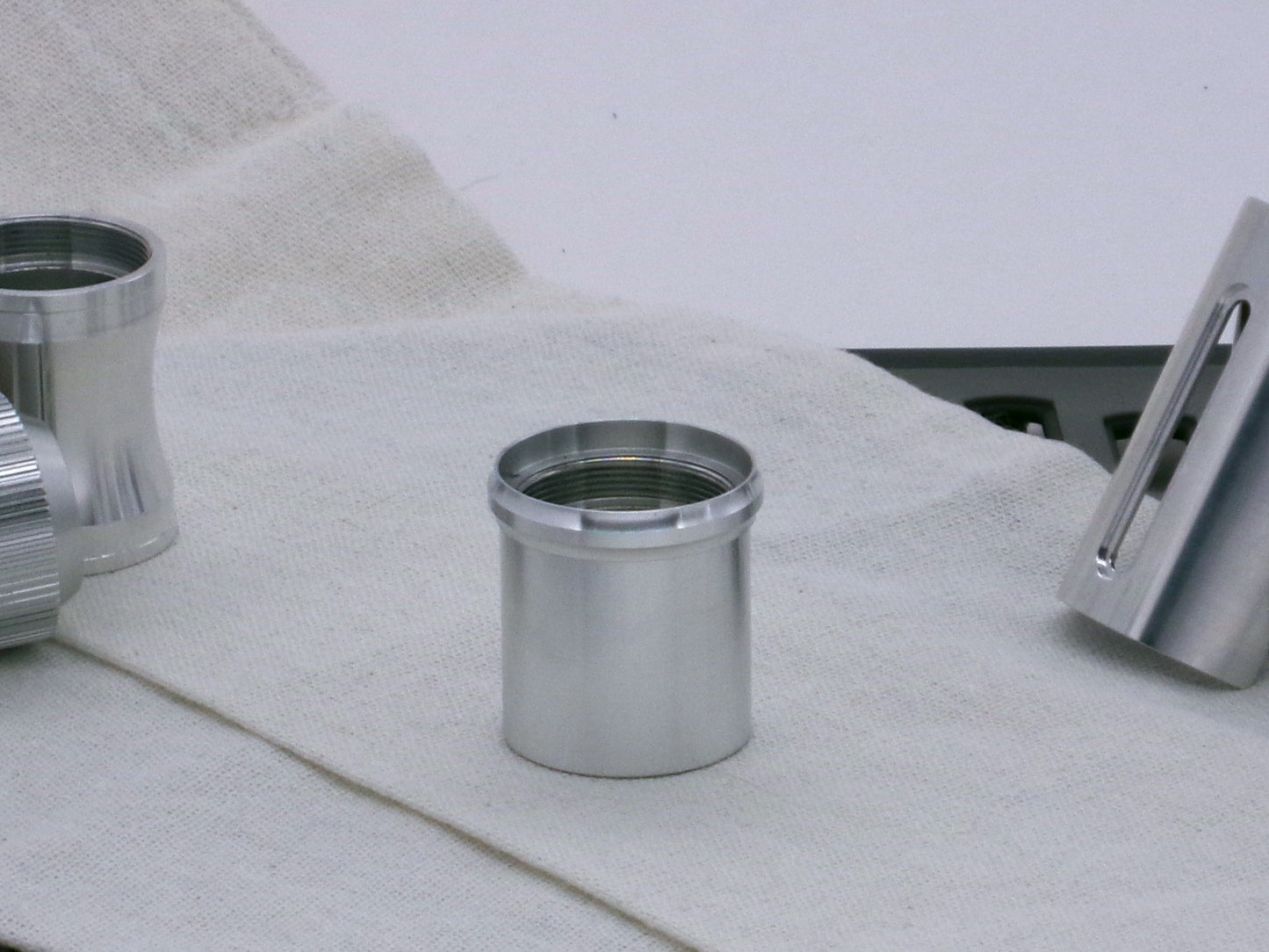 Single VHC compatible, aluminum lightsaber accent rings installed on a lightsaber body component.