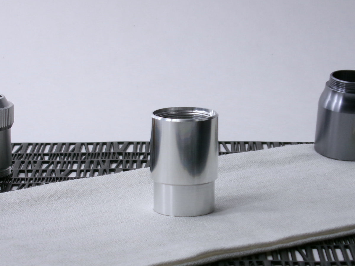 A beveled, VHC-compatible, lightsaber Accent Sleeve sits vertically, installed on a CSF Body Segment.