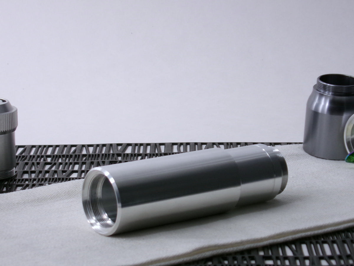 A simple, VHC-compatible, lightsaber Accent Sleeve sits 3/4 view installed on a CSF Body Segment.
