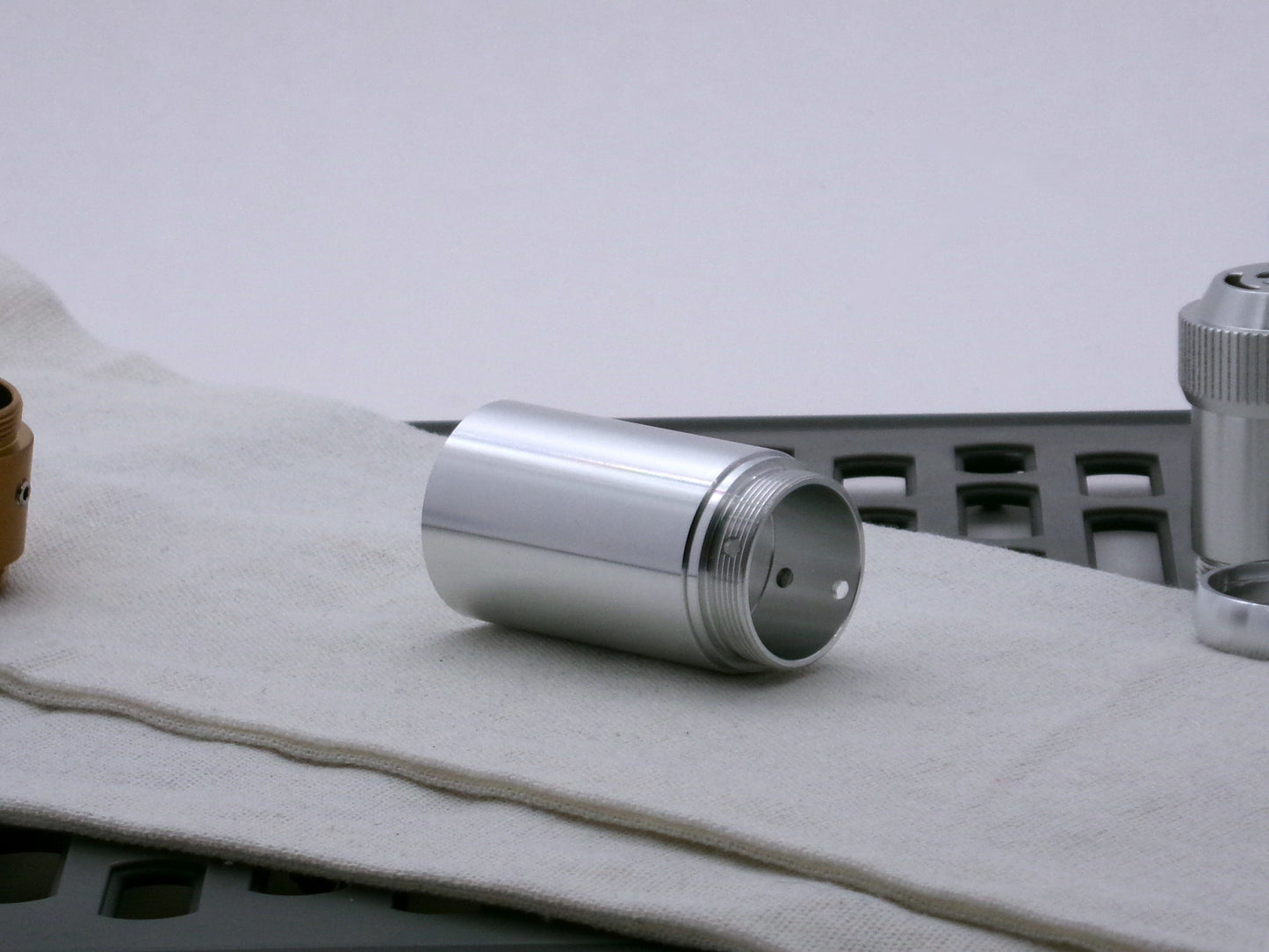 Single, aluminum male/male threaded adapter for VHC lightsabers installed in a Type_3 Body Component; 31.5mm diameter.
