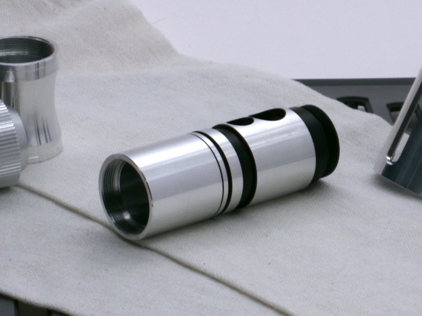 A stealthy, no-show, aluminum male-to-male formatted adapter installed and hidden between female formatted parts.
