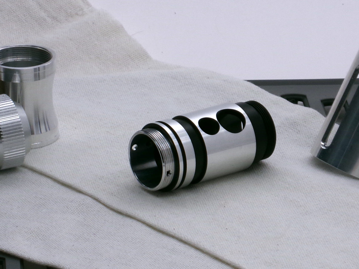 A stealthy, no-show, aluminum male-to-male formatted adapter that hides between female formatted installed in a VHC lightsaber switch.