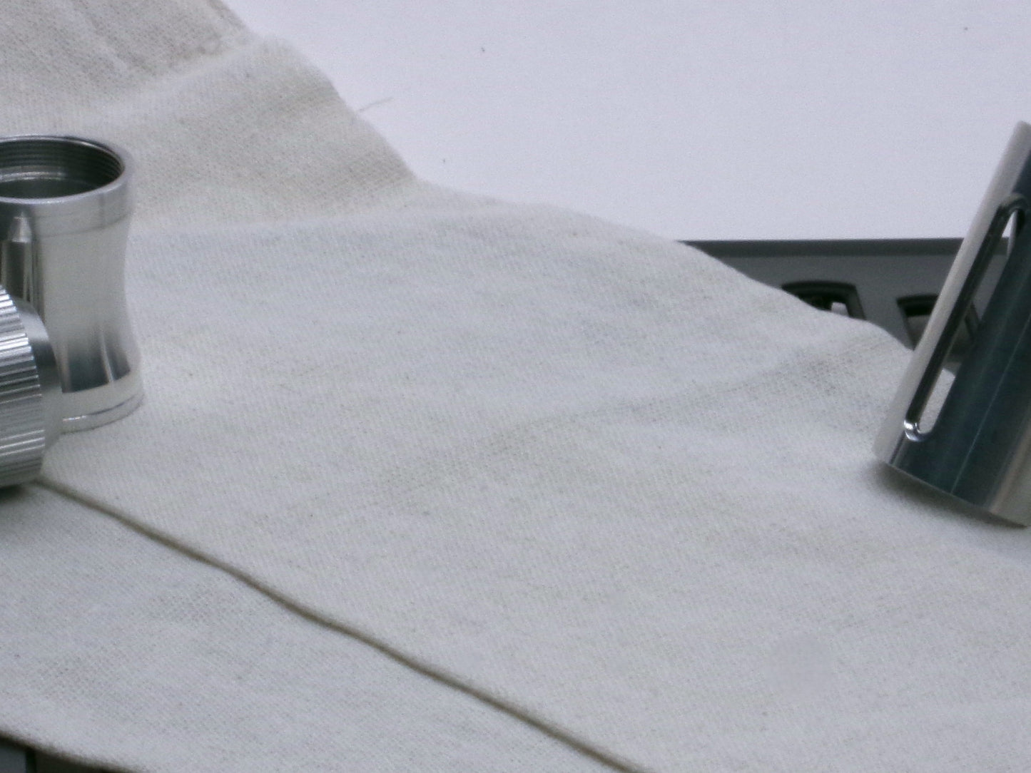 A stealthy, no-show, aluminum male-to-male formatted adapter that hides between female formatted parts.