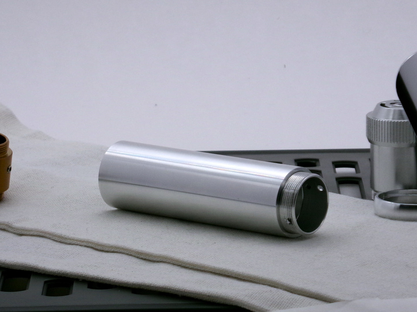 Single aluminum female/female threaded body component for VHC lightsabers in a M-F VHC configuration; three-quarter view.