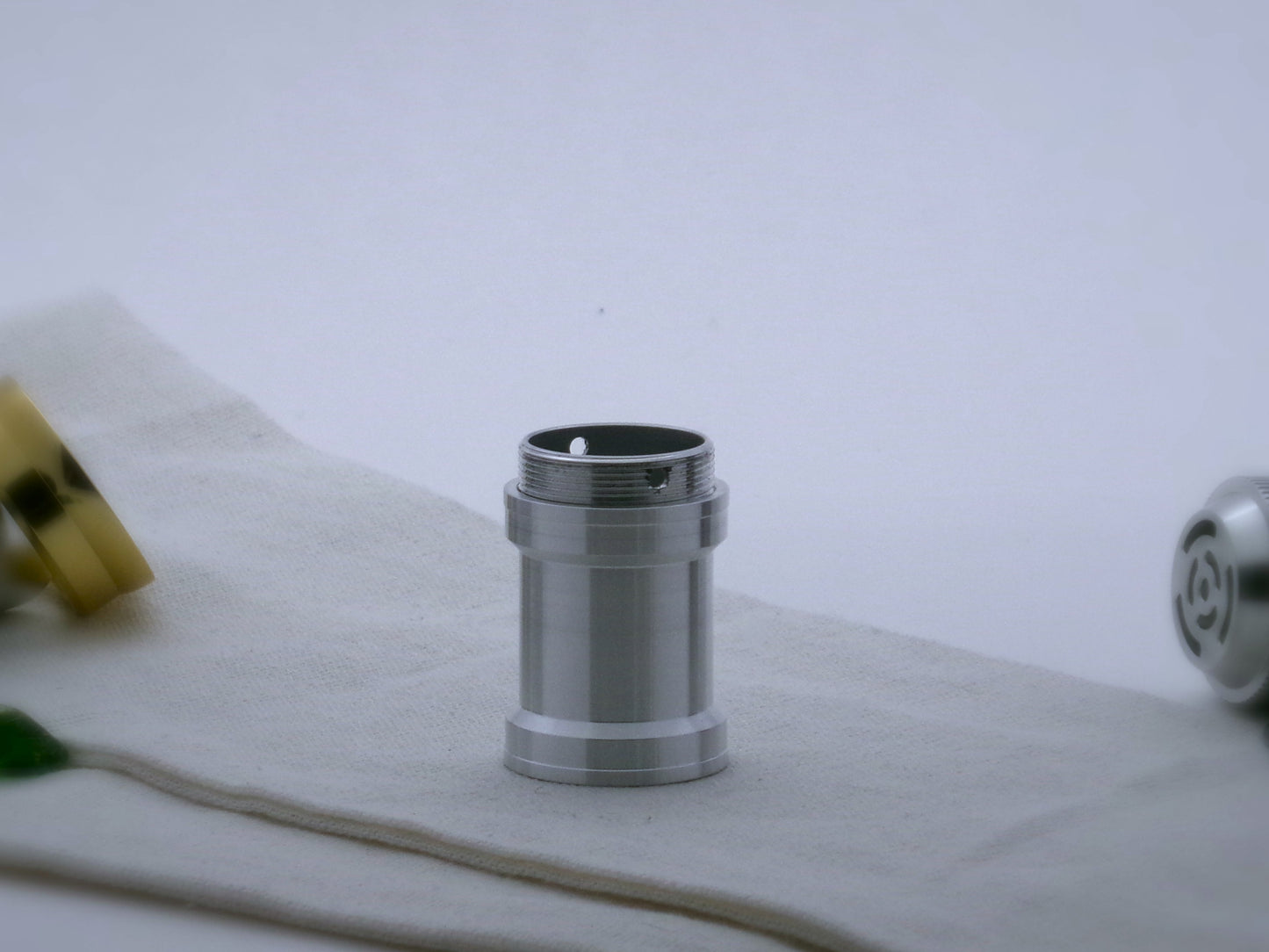 Aluminum female/female threaded angular grip choke with Stealth threaded Adapter installed converting to VHC lightsaber format.