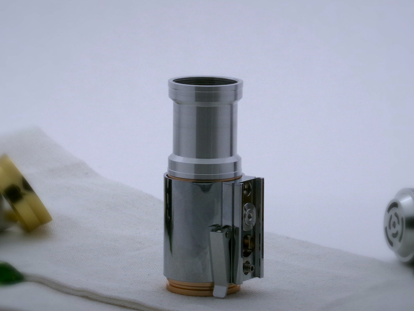 Aluminum female/female threaded angular grip choke installed on a VHC switch; vertical orientation.