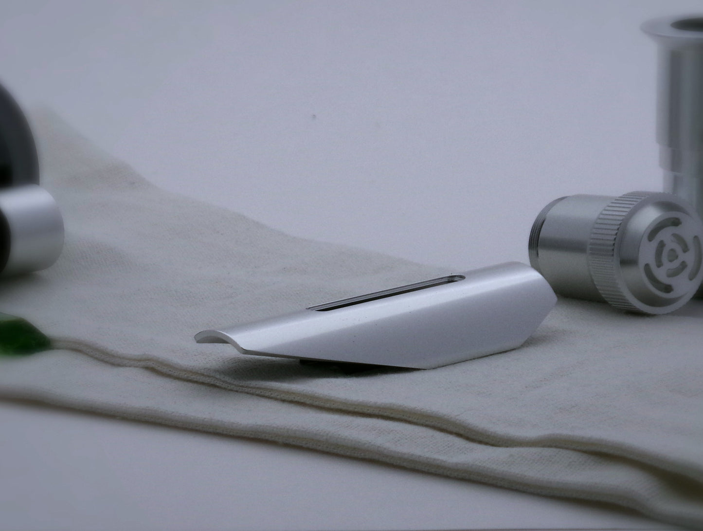 Aluminum, shield shaped, half shroud for VHC lightsabers; unmounted three-quarter view.