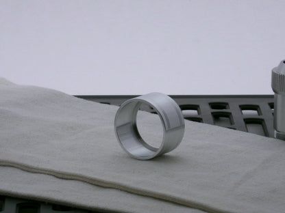 Single aluminum accent cap for VHC lightsabers, three-quarter view showing inner detail and shimsert.