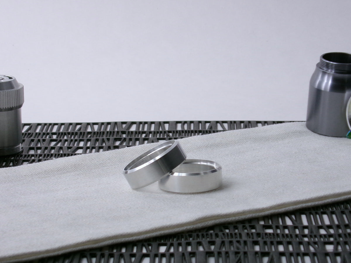 A pair of VHC-compatible Accent Bands sit askew on a cloth.