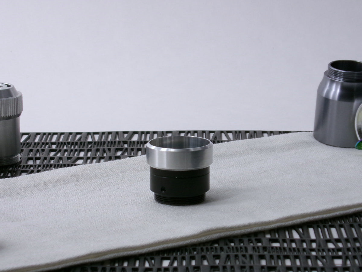 A VHC-compatible lightsaber accent band prepared for installation, shim down, on an VHC Band.