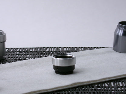 A VHC-compatible lightsaber accent band prepared for installation, shim up, on a VHC Band.