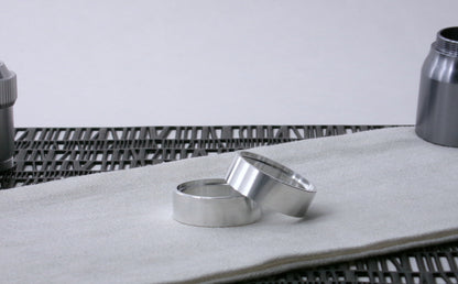 Pair of VHC-compatible Accent Band Type_3's, askew on a canvas cloth.