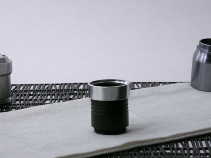 A VHC-compatible Accent Band Type_3, positioned for installation, shim side up on a VHC part.