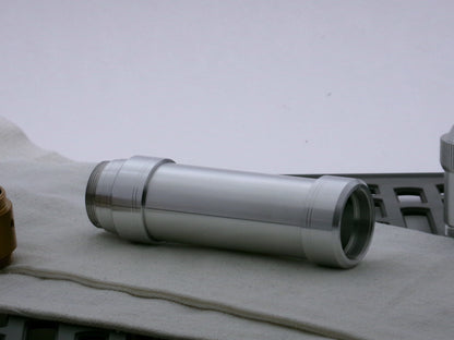 Two aluminum accent caps for VHC lightsabers on both ends of a VHC grip, with the distant end retained by a M/M Adapter