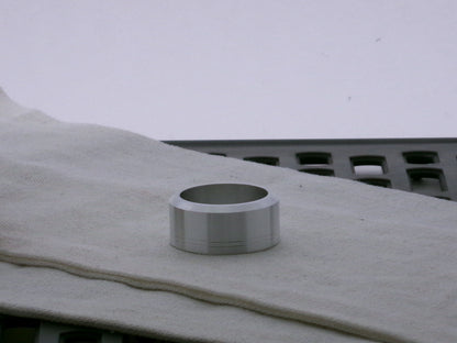 Single aluminum accent cap for VHC lightsabers, beveled edge facing upward, with two embossed grooves. 