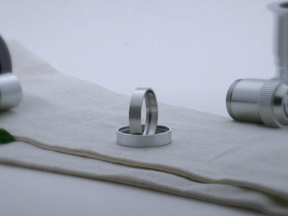 Pair of simple accent rings for VHC lightsabers, one standing vertically on edge inside the other.