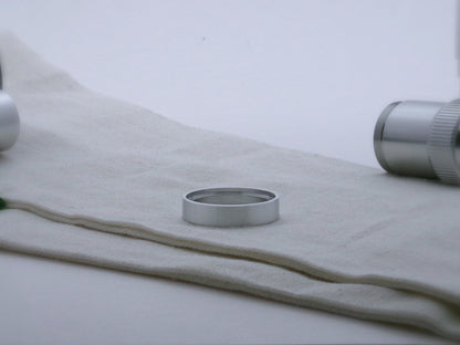 Single simple aluminum accent ring for VHC lightsabers, shimsert facing upward.
