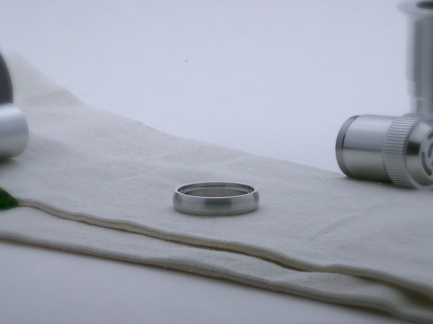 Single rounded profile aluminum accent ring for VHC lightsabers, shimsert facing upward.