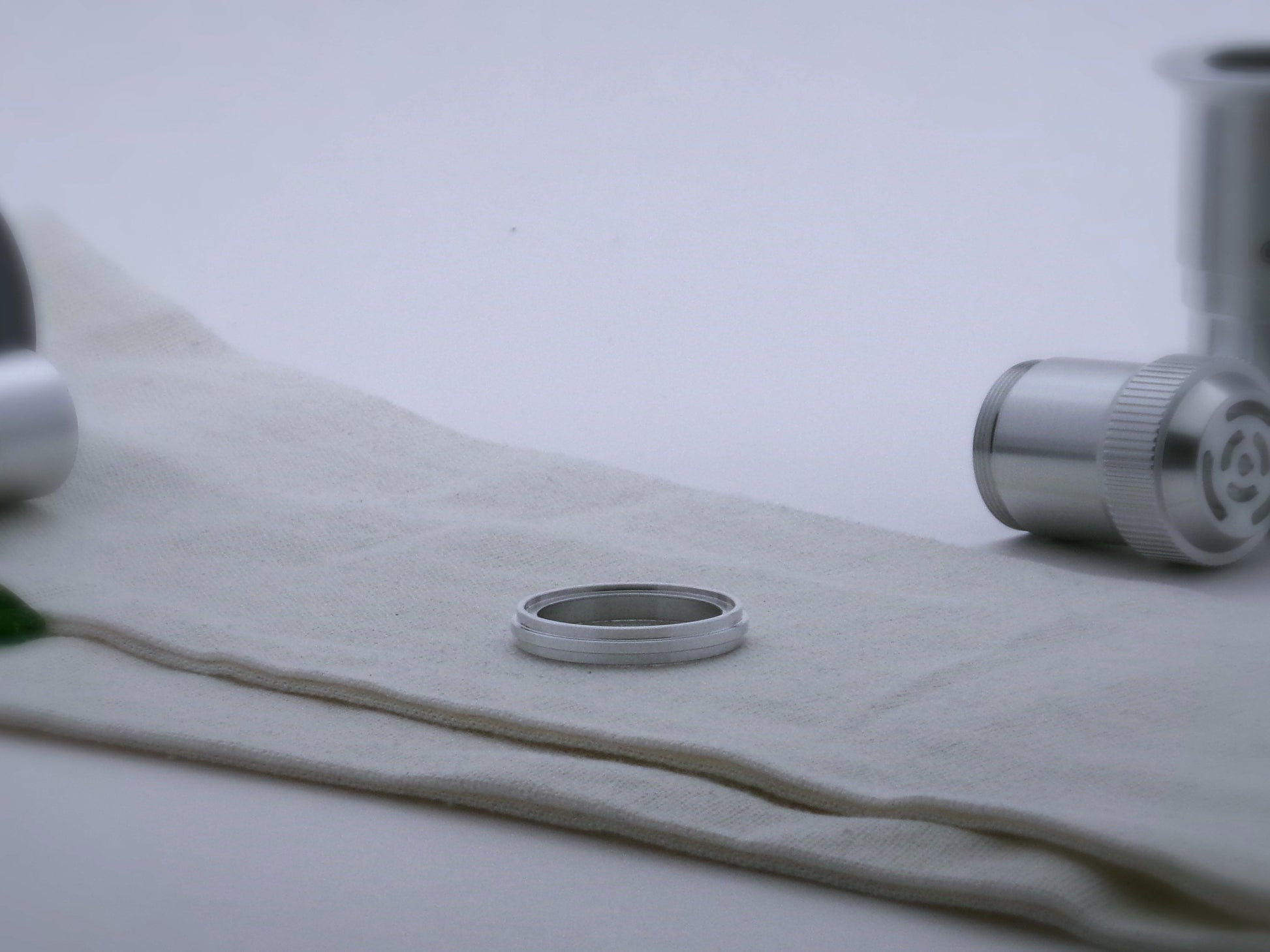 Single aluminum accent ring for VHC lightsabers with a proud central rib, shimsert facing upward.