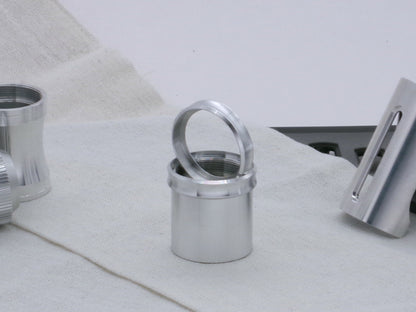 Pair of VHC compatible, aluminum lightsaber accent rings, installed and displayed on a lightsaber body segment.