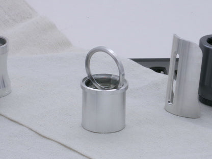 Pair of VHC compatible, aluminum lightsaber accent rings, one installed on a lightsaber body segment, the other displayed.