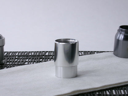 A beveled, VHC-compatible, lightsaber Accent Sleeve sits vertically, installed on a CSF Body Segment.
