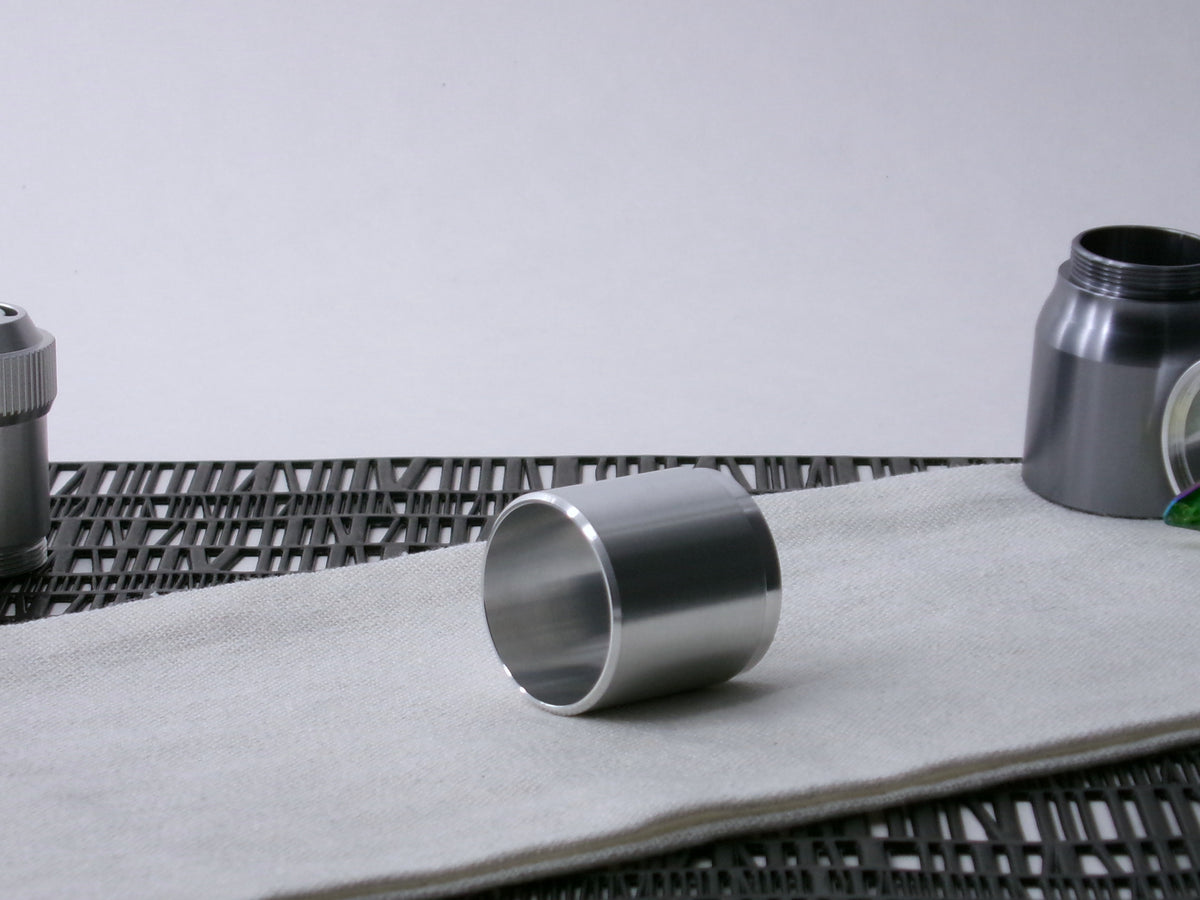 A stepped, VHC-compatible Accent Sleeve sits 3/4 view showing interior-view on a cloth.