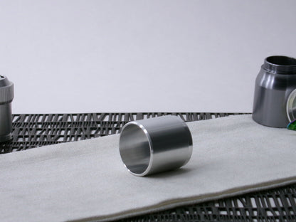 A stepped, VHC-compatible Accent Sleeve sits 3/4 view showing interior-view on a cloth.