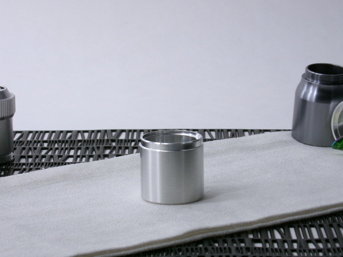 A stepped, VHC-compatible Accent Sleeve sits vertical on a cloth.