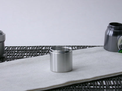 A stepped, VHC-compatible Accent Sleeve sits vertical on a cloth.