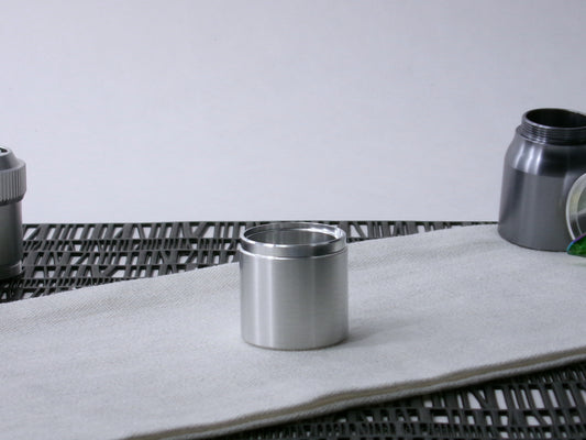A stepped, VHC-compatible Accent Sleeve sits vertical on a cloth.