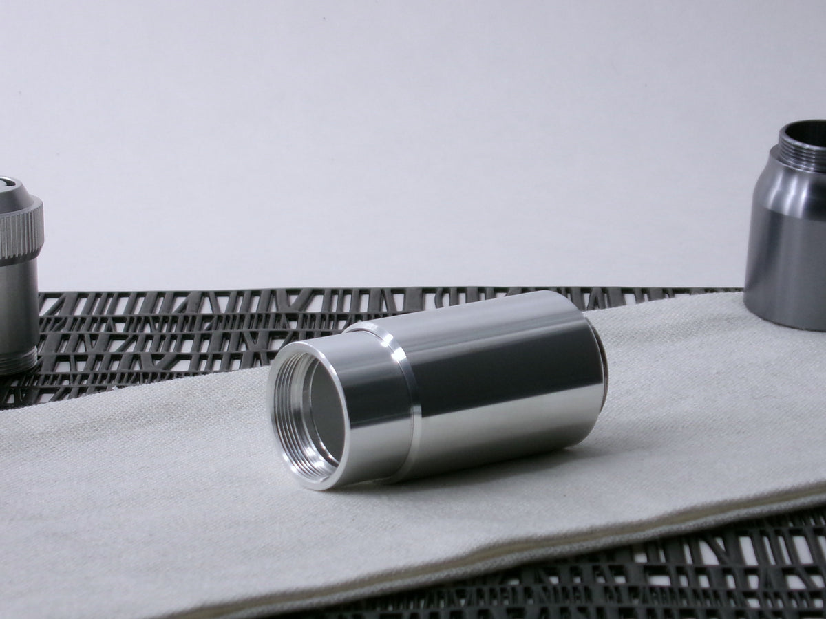 A beveled, VHC-compatible, lightsaber Accent Sleeve sits 3/4 view installed on a CSF Body Segment.