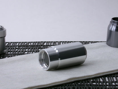 A beveled, VHC-compatible, lightsaber Accent Sleeve sits 3/4 view installed on a CSF Body Segment.