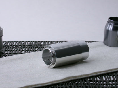 A simple, VHC-compatible, lightsaber Accent Sleeve sits 3/4 view installed on a CSF Body Segment.