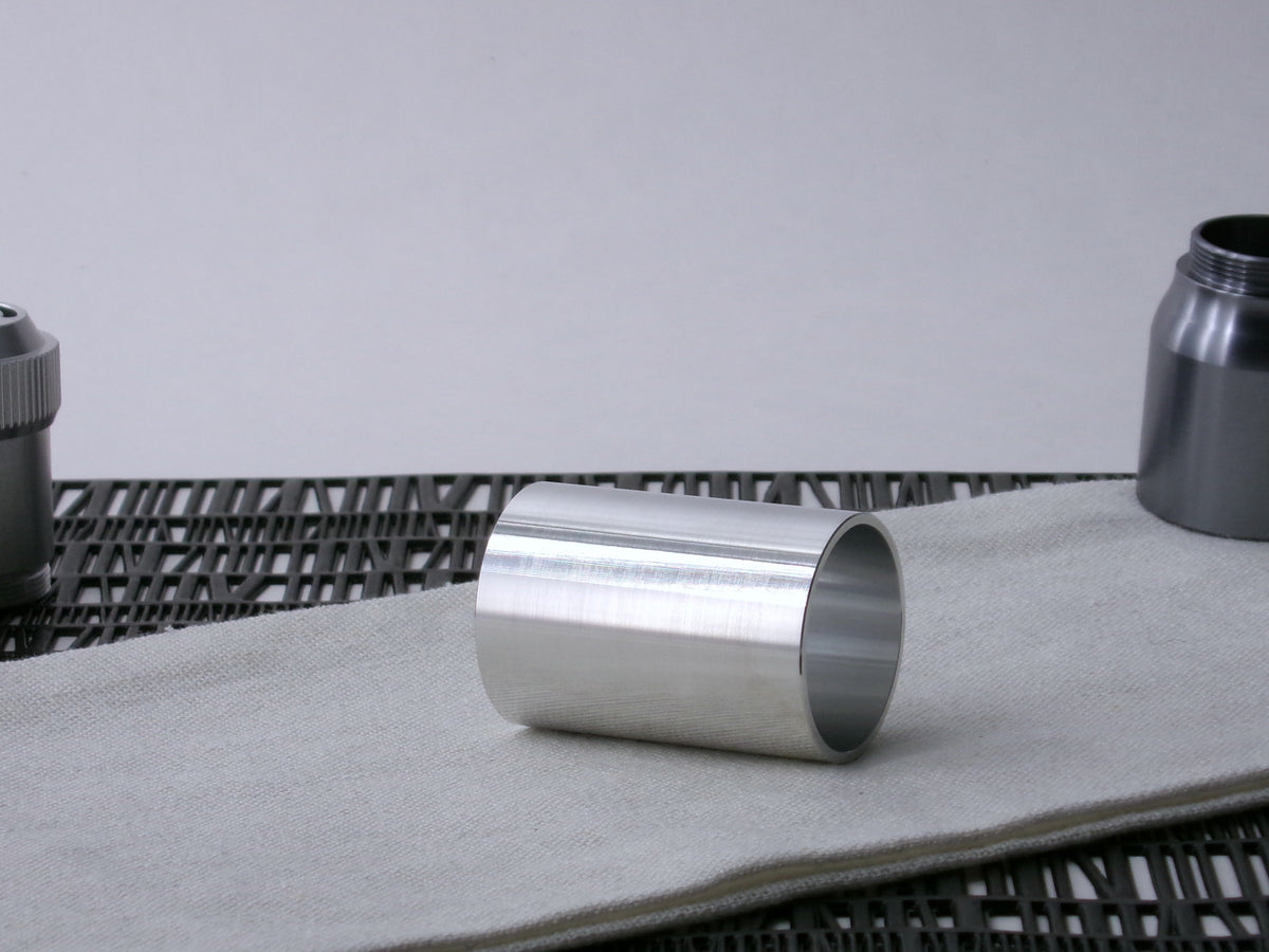 A simple, VHC-compatible Accent Sleeve sits 3/4 view showing interior-view on a cloth.