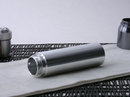 A beveled, VHC-compatible, lightsaber Accent Sleeve sits 3/4 view installed on a CSF Body Segment.