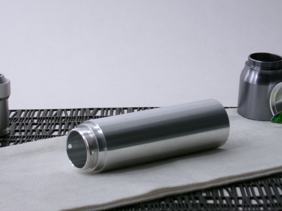 A simple, VHC-compatible, lightsaber Accent Sleeve sits 3/4 view installed on a CSF Body Segment.