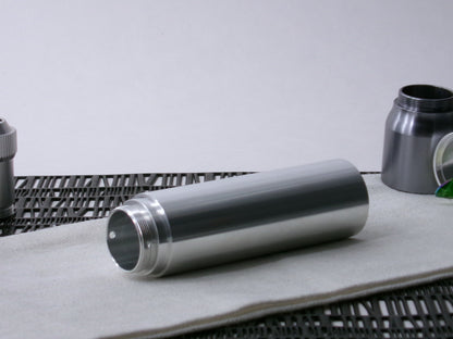 A simple, VHC-compatible, lightsaber Accent Sleeve sits 3/4 view installed on a CSF Body Segment.