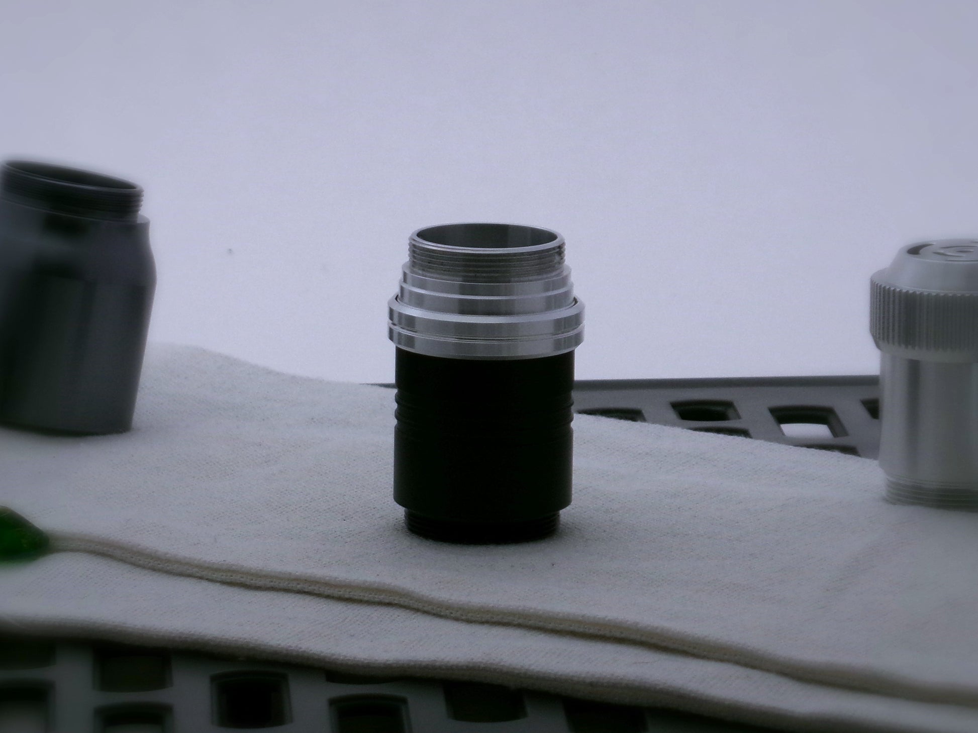 Single aluminum male/male threaded stepped adapter securing a Type_2.1 Accent ring to a VHC Lightsaber extension.