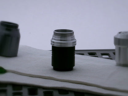 Single aluminum male/male threaded stepped adapter securing a Type_2.1 Accent ring to a VHC Lightsaber extension.