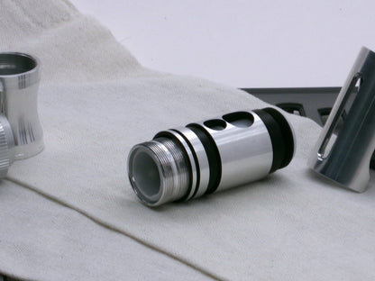 A stealthy, no-show, aluminum male-to-male formatted adapter that hides between female formatted parts in 3/4 view with switch prior to install.