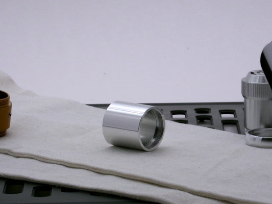Single aluminum female/female threaded body component for VHC lightsabers; three-quarter view.