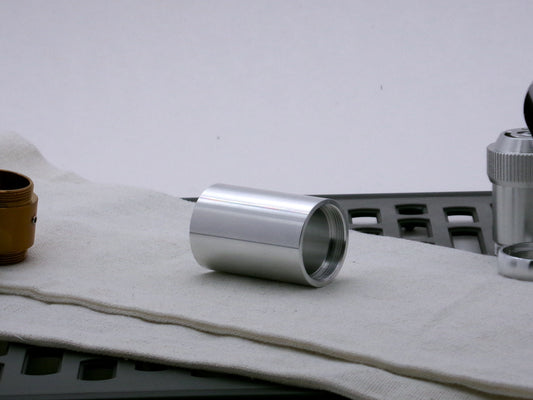 Single aluminum female/female threaded body component for VHC lightsabers; three-quarter view.