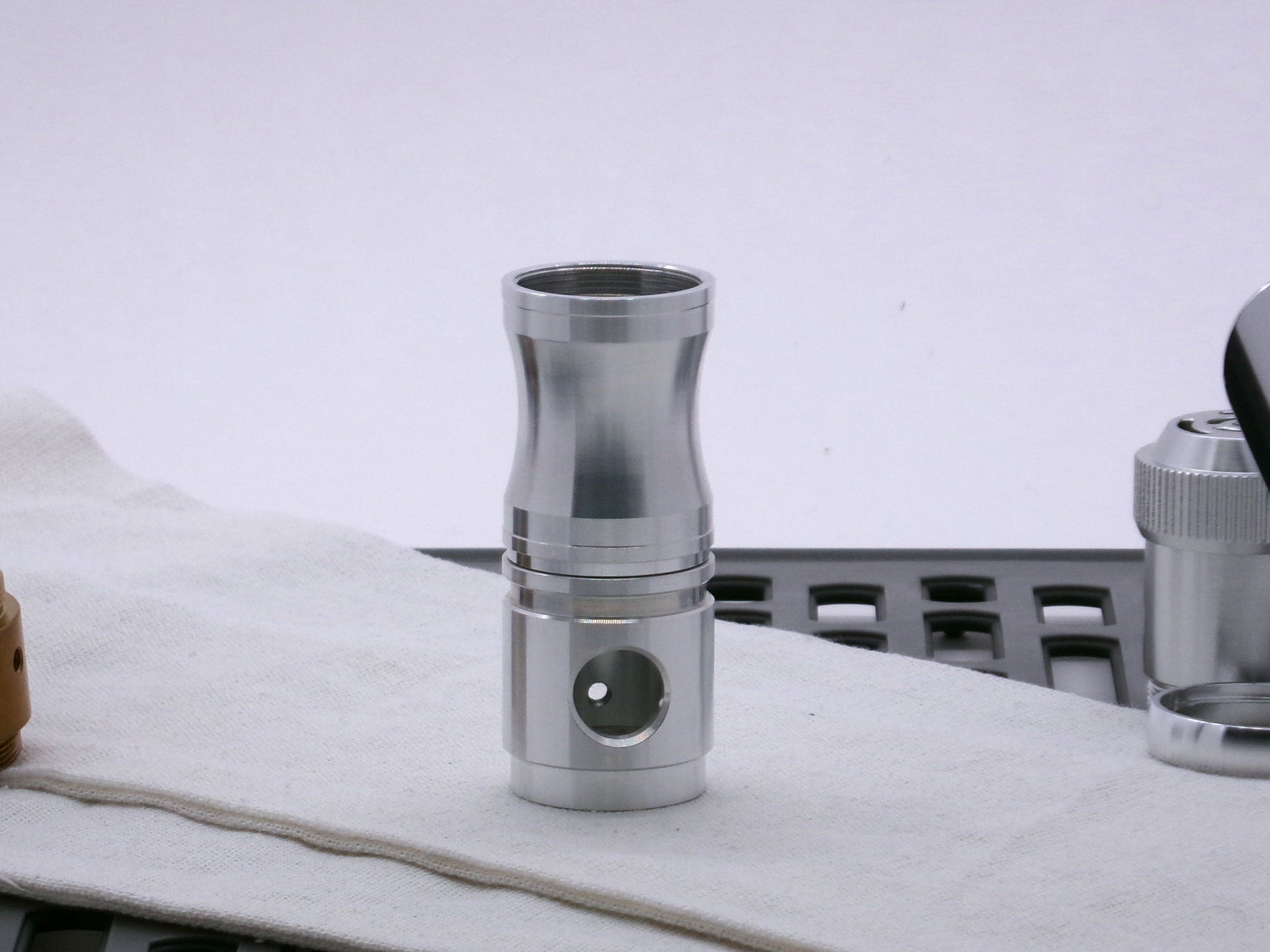 Aluminum female/female threaded curved grip choke installed on a Switch-Type_2.1 for VHC lightsabers.