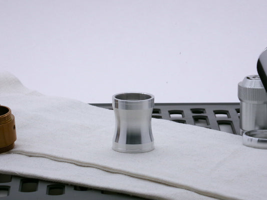 Aluminum female/female threaded curved grip choke for VHC lightsabers; standing proud.