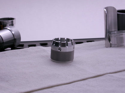 VHC compatible emitter tip connected to a knurled body segment on a cloth