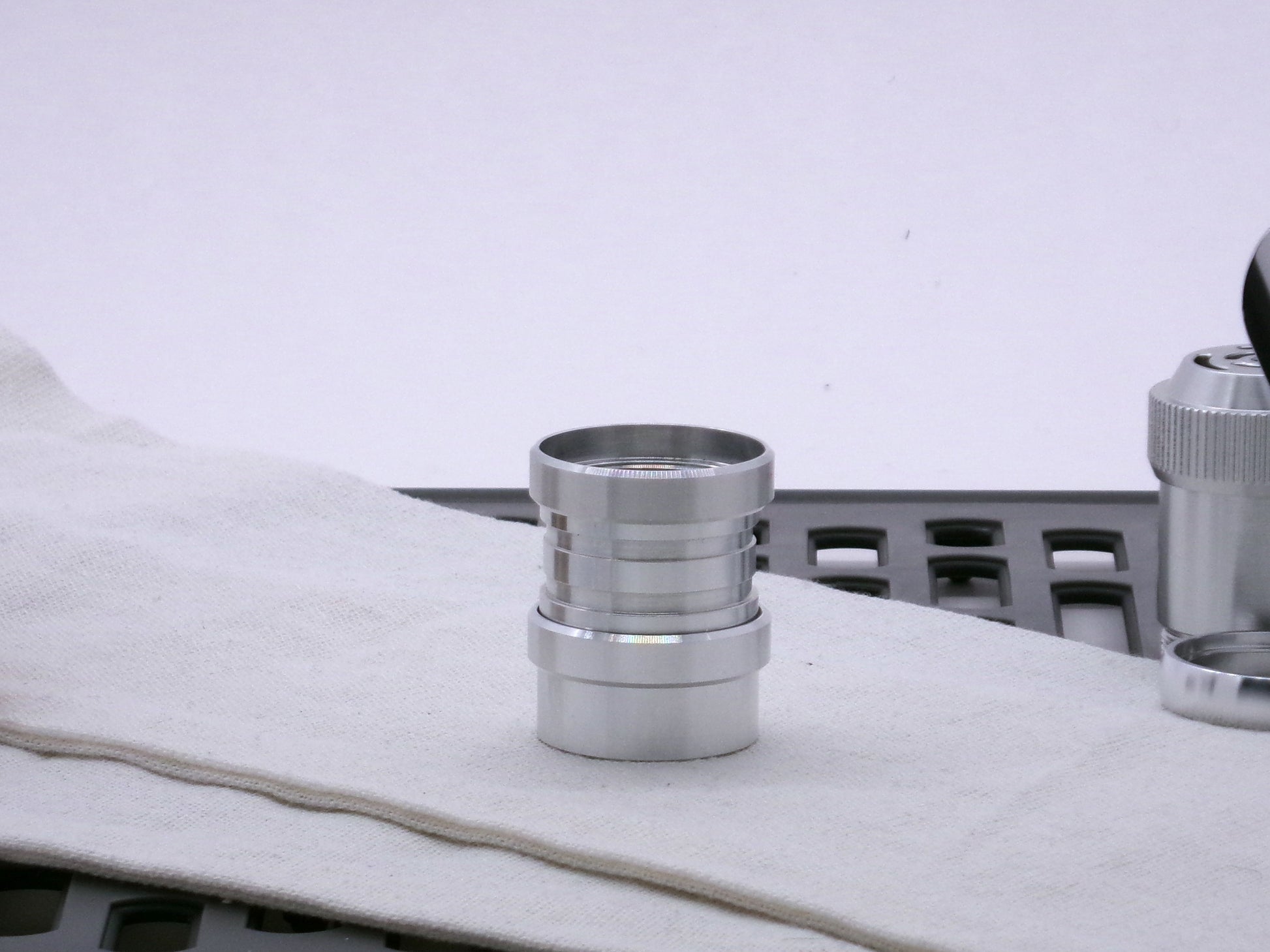 Aluminum female/female threaded ribbed extension for VHC lightsabers installed among various CSF accent rings and body components.