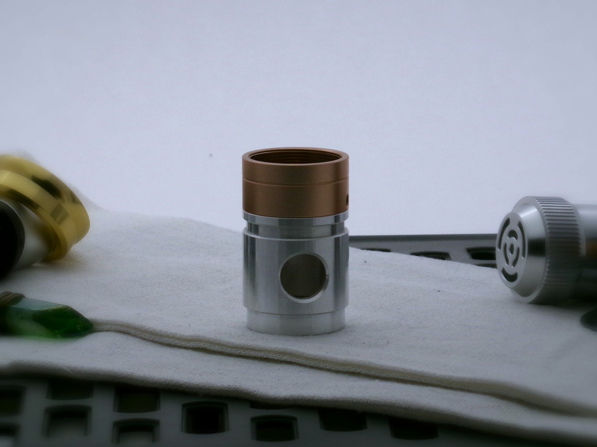 Aluminum female/female threaded switch sections for VHC lightsabers installed under a Vire Sabers VHC Band; standing proud.